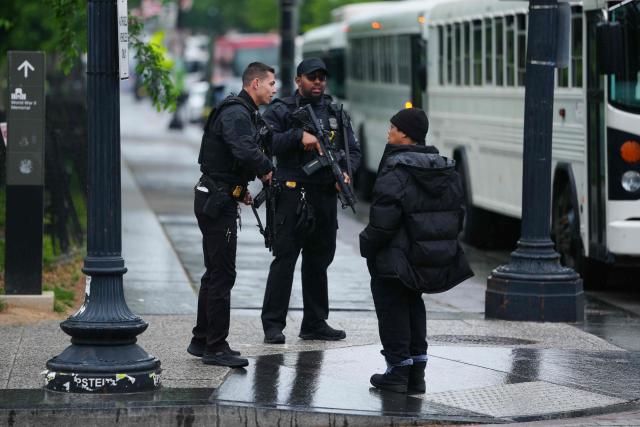US Secret Service block a street near the White House before US President Donald Trump and First Lady Melania Trump greet Britain's King Charles III and Queen Camilla for an arrival ceremony on the South Lawn of the White House in Washington, DC, on April 28, 2026. (Photo by Aaron Schwartz / AFP)