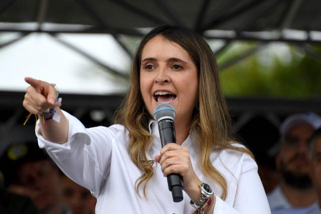 (FILES) Colombia's presidential candidate Paloma Valencia, of the Centro Democratico party, speaks during a campaign rally in Rionegro, Antioquia department, Colombia, on April 13, 2026. Right-wing presidential candidate Paloma Valencia said on April 27 that Colombia’s government informed her of a plot to assassinate her, allegedly orchestrated by dissident FARC guerrillas responsible for deadly attacks against the civilian population over the weekend. (Photo by Jaime SALDARRIAGA / AFP)