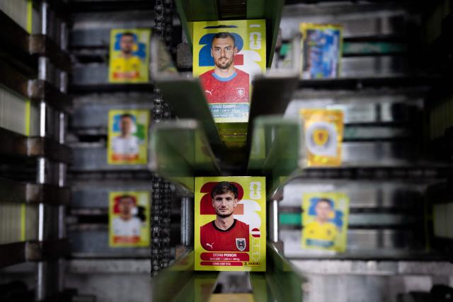Collectible cards featuring football players for the upcoming 2026 FIFA World Cup hosted by the US, Canada and Mexico, are pictured at the Panini Group factory in Modena, northern Italy, on April 28, 2026. The Panini Group holds the exclusive rights for the official collectible cards and stickers for the 2026 FIFA World Cup hosted by the US, Canada, and Mexico. (Photo by MARCO BERTORELLO / AFP)