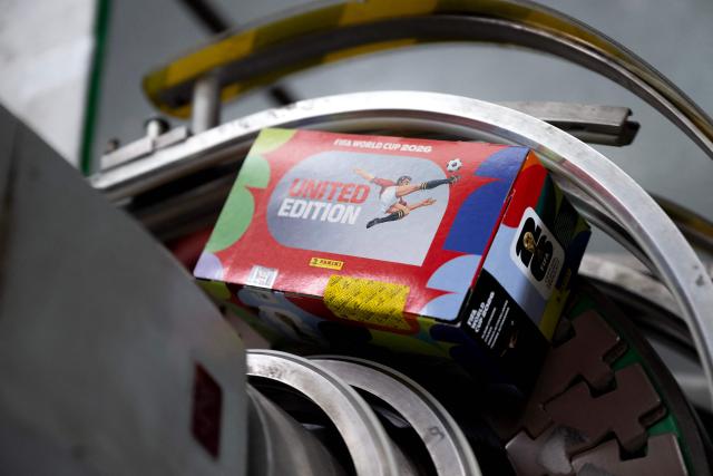 A sticker packets box for collectible cards featuring football players  for the upcoming 2026 FIFA World Cup hosted by the US, Canada and Mexico, is pictured at the Panini Group factory in Modena, northern Italy, on April 28, 2026. The Panini Group holds the exclusive rights for the official collectible cards and stickers for the 2026 FIFA World Cup hosted by the US, Canada, and Mexico. (Photo by MARCO BERTORELLO / AFP)