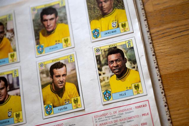 This picture shows Brazilian forward Pele on the first World Cup Panini album for Mexico 70 at the Panini Group factory in Modena, northern Italy, on April 28, 2026. The Panini Group holds the exclusive rights for the official collectible cards and stickers for the 2026 FIFA World Cup hosted by the US, Canada, and Mexico. (Photo by MARCO BERTORELLO / AFP)