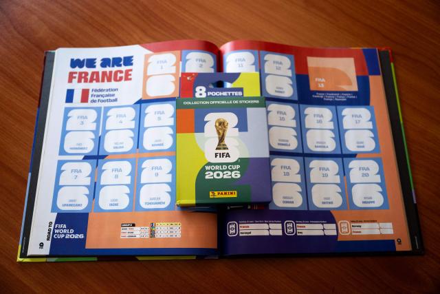 This picture shows the album and box of collectible cards featuring football players for the upcoming 2026 FIFA World Cup hosted by the US, Canada and Mexico, at the Panini Group factory in Modena, northern Italy, on April 28, 2026. The Panini Group holds the exclusive rights for the official collectible cards and stickers for the 2026 FIFA World Cup hosted by the US, Canada, and Mexico. (Photo by MARCO BERTORELLO / AFP)