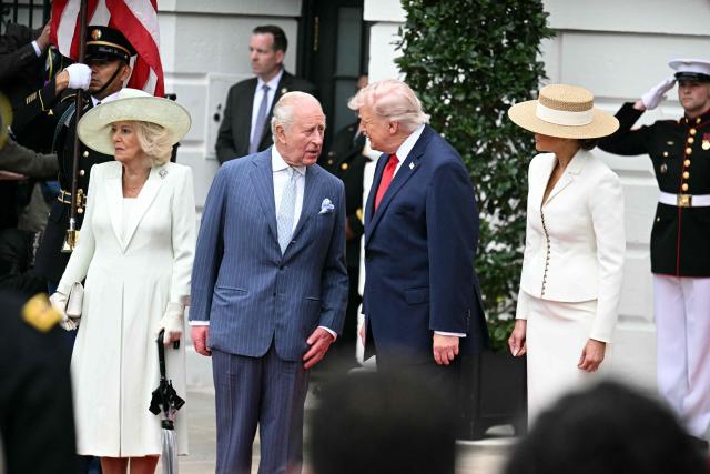 US President Donald Trump and First Lady Melania Trump, greet Britain's King Charles III and Queen Camilla during an arrival ceremony on the South Lawn of the White House in Washington, DC, on April 28, 2026. (Photo by Jim WATSON / AFP)