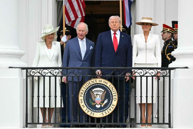 US President Donald Trump, First Lady Melania Trump, Britain's King Charles III and Queen Camilla take part in an arrival ceremony on the South Lawn of the White House in Washington, DC, on April 28, 2026. (Photo by Mandel NGAN / AFP)