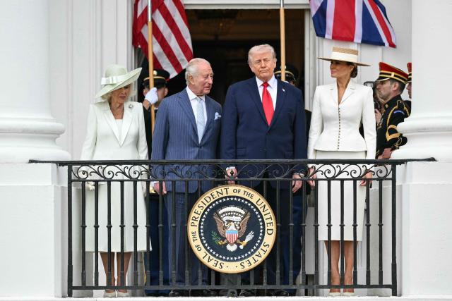 US President Donald Trump, First Lady Melania Trump, Britain's King Charles III and Queen Camilla take part in an arrival ceremony on the South Lawn of the White House in Washington, DC, on April 28, 2026. (Photo by Mandel NGAN / AFP)