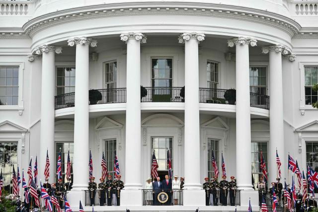 US President Donald Trump, First Lady Melania Trump, Britain's King Charles III and Queen Camilla take part in an arrival ceremony on the South Lawn of the White House in Washington, DC, on April 28, 2026. (Photo by Mandel NGAN / AFP)
