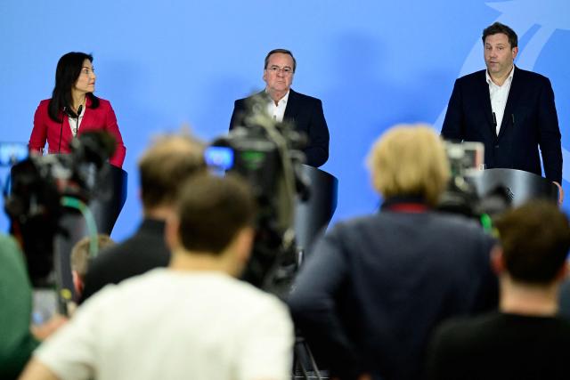 German Finance Minister and Vice Chancellor Lars Klingbeil (R), German Defence Minister Boris Pistorius and German Economy and Energy Minister Katherina Reiche address a press conference on a round table meeting on strengthening German-Ukrainian cooperation in the security and defence industry at the Defence Ministry in Berlin on April 28, 2026. (Photo by John MACDOUGALL / AFP)