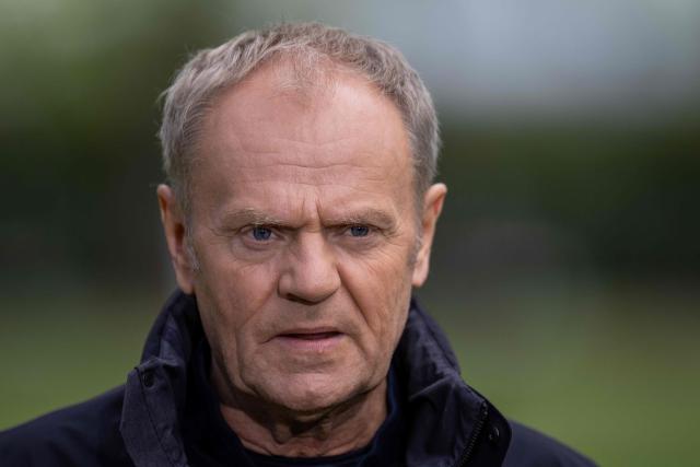 Poland's Prime Minister Donald Tusk speaks during a press conference in front of the Chancellery in Warsaw on April 28, 2026, after a prisoner exchange. Poland on April 28 released a jailed Russian archaeologist, who was wanted by Ukraine, as part of a multi-country swap deal that also saw a Polish journalist freed from a Belarusian jail. (Photo by Wojtek RADWANSKI / AFP)