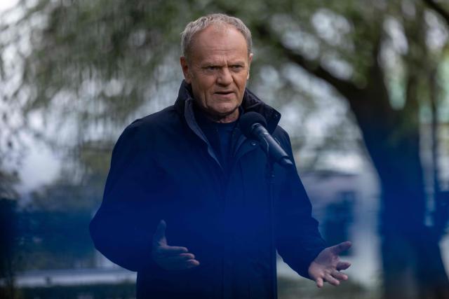Poland's Prime Minister Donald Tusk speaks during a press conference in front of the Chancellery in Warsaw on April 28, 2026, after a prisoner exchange. Poland on April 28 released a jailed Russian archaeologist, who was wanted by Ukraine, as part of a multi-country swap deal that also saw a Polish journalist freed from a Belarusian jail. (Photo by Wojtek RADWANSKI / AFP)