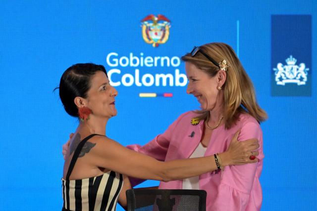 Dutch Minister of Climate and Green Growth Stientje van Veldhoven (R) and Colombia's Environment Minister Irene Velez greet during the International Conference on the Just Transition Away from Fossil Fuels in Santa Marta, Colombia, on April 28, 2026. (Photo by Raul ARBOLEDA / AFP)