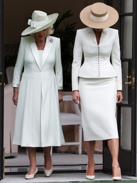 First Lady Melania Trump (R) and Britain's Queen Camilla arrive to take part in a youth activity on the White House tennis court area in Washington, DC, on April 28, 2026. (Photo by Suzanne Plunkett / POOL / AFP)