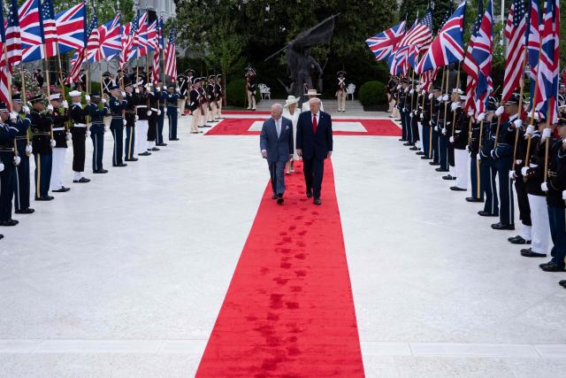 US President Donald Trump, Britain's King Charles III, First Lady Melania Trump, and Queen Camilla walk through the Rose Garden on their way to the Oval Office following an arrival ceremony on the South Lawn of the White House in Washington, DC, on April 28, 2026. (Photo by Brendan Smialowski / AFP)