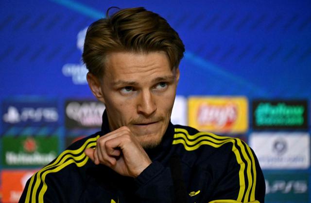 Arsenal's Norwegian midfielder #08 Martin Odegaard attends a press conference on the eve of the UEFA Champions League semi final first leg football match against Club Atletico de Madrid at the Metropolitano stadium in Madrid on April 28, 2026. (Photo by Javier SORIANO / AFP)