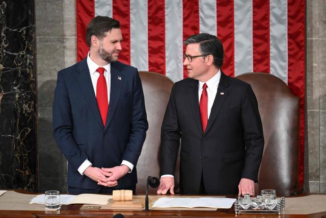 US Vice President JD Vance and Speaker of the House Mike Johnson speak with each other before the arrival of Britain's King Charles III during a Joint Meeting of Congress in the House Chamber at the US Capitol in Washington, DC, on April 28, 2026. (Photo by SAUL LOEB / AFP)