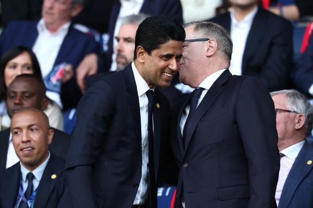 Paris Saint Germain's Qatari president Nasser al-Khelaifi (L) attends the UEFA Champions League semi-final first leg football match between Paris Saint-Germain (PSG) and Bayern Munich at the Parc des Princes in Paris on April 28, 2026. (Photo by FRANCK FIFE / AFP)