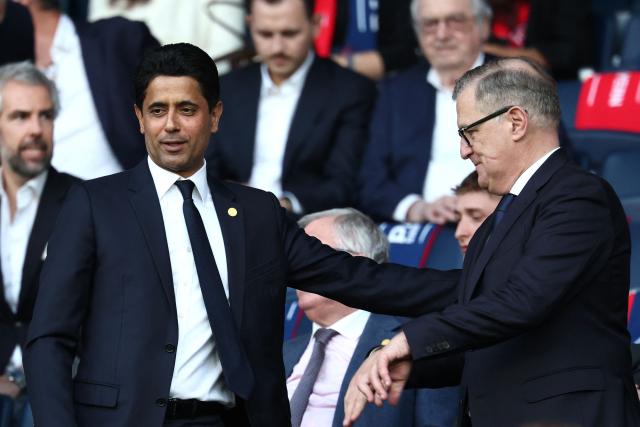 Paris Saint Germain's Qatari president Nasser al-Khelaifi greets Bayern Munich's German CEO Jan-Christian Dreesen (R) ahead of the UEFA Champions League semi-final first leg football match between Paris Saint-Germain (PSG) and Bayern Munich at the Parc des Princes in Paris on April 28, 2026. (Photo by FRANCK FIFE / AFP)