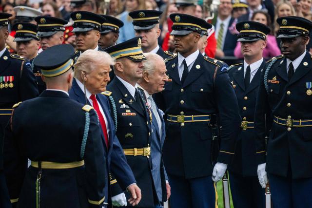 US President Donald Trump and Britain's King Charles III review the troops during an arrival ceremony on the South Lawn of the White House in Washington, DC, on April 28, 2026. (Photo by Jim Watson / AFP)