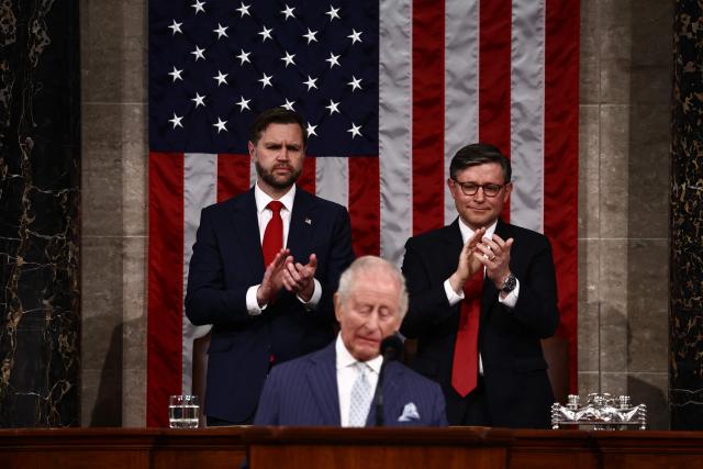 Britain's King Charles III is applauded by by House Speaker Mike Johnson and US Vice President JD Vance as he speaks to a Joint Meeting of Congress in the House Chamber at the US Capitol in Washington, DC, on April 28, 2026. (Photo by Henry NICHOLLS / POOL / AFP)
