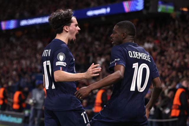 Paris Saint-Germain's French forward #10 Ousmane Dembele (R) celebrates with Paris Saint-Germain's Portuguese midfielder #17 Vitinha after scoring his team third goal during the UEFA Champions League semi-final first leg football match between Paris Saint-Germain (PSG) and Bayern Munich at the Parc des Princes in Paris on April 28, 2026. (Photo by Franck FIFE / AFP)