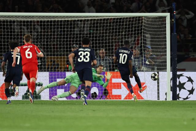 Paris Saint-Germain's French forward #10 Ousmane Dembele shoots a penalty and scores his team third goal during the UEFA Champions League semi-final first leg football match between Paris Saint-Germain (PSG) and Bayern Munich at the Parc des Princes in Paris on April 28, 2026. (Photo by Anne-Christine POUJOULAT / AFP)