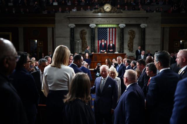 Britain's King Charles III and Britain's Queen Camilla greet people after his address to a Joint Meeting of Congress in the House Chamber at the US Capitol in Washington, DC, on April 28, 2026. (Photo by HENRY NICHOLLS / POOL / AFP)