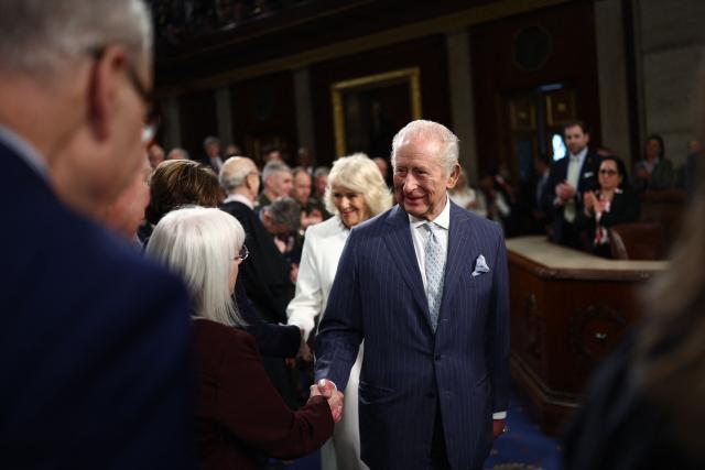 Britain's King Charles III and Britain's Queen Camilla greet people after his address to a Joint Meeting of Congress in the House Chamber at the US Capitol in Washington, DC, on April 28, 2026. (Photo by HENRY NICHOLLS / POOL / AFP)