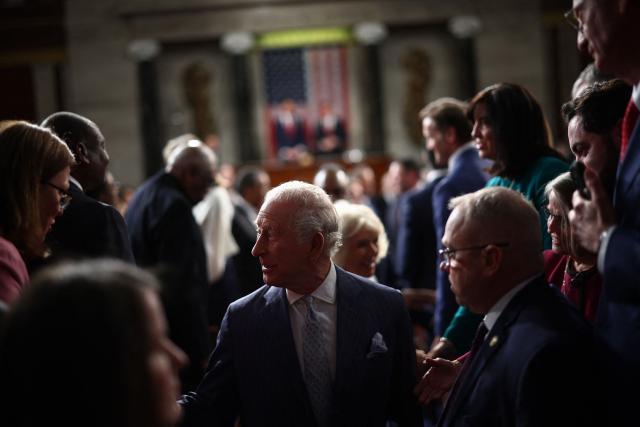 Britain's King Charles III greets people after addressing a Joint Meeting of Congress in the House Chamber at the US Capitol in Washington, DC, on April 28, 2026. (Photo by HENRY NICHOLLS / POOL / AFP)