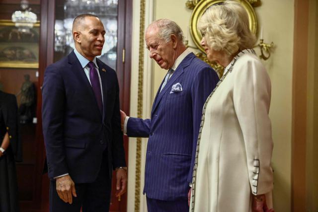 Britain's King Charles III and Queen Camilla are greeted by US Representative and Minority Leader Hakeem Jeffries, Democrat from New York, before the King's address to a Joint Meeting of Congress in the House Chamber at the US Capitol in Washington, DC, on April 28, 2026. (Photo by Henry NICHOLLS / POOL / AFP)