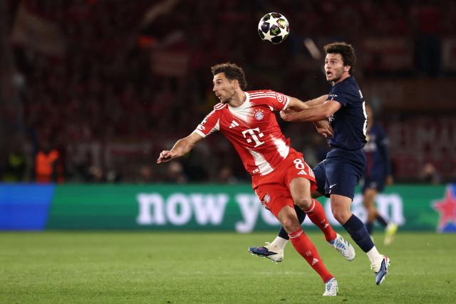 Bayern Munich's German midfielder #08 Leon Goretzka fights for the ball with Paris Saint-Germain's Portuguese midfielder #87 Joao Neves during the UEFA Champions League semi-final first leg football match between Paris Saint-Germain (PSG) and Bayern Munich at the Parc des Princes in Paris on April 28, 2026. (Photo by FRANCK FIFE / AFP)