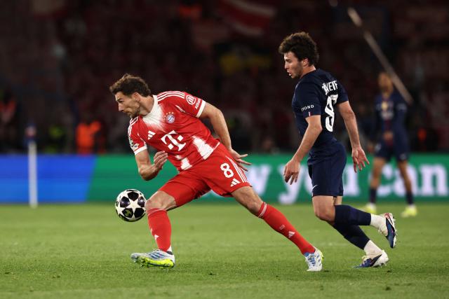 Bayern Munich's German midfielder #08 Leon Goretzka fights for the ball with Paris Saint-Germain's Portuguese midfielder #87 Joao Neves during the UEFA Champions League semi-final first leg football match between Paris Saint-Germain (PSG) and Bayern Munich at the Parc des Princes in Paris on April 28, 2026. (Photo by FRANCK FIFE / AFP)