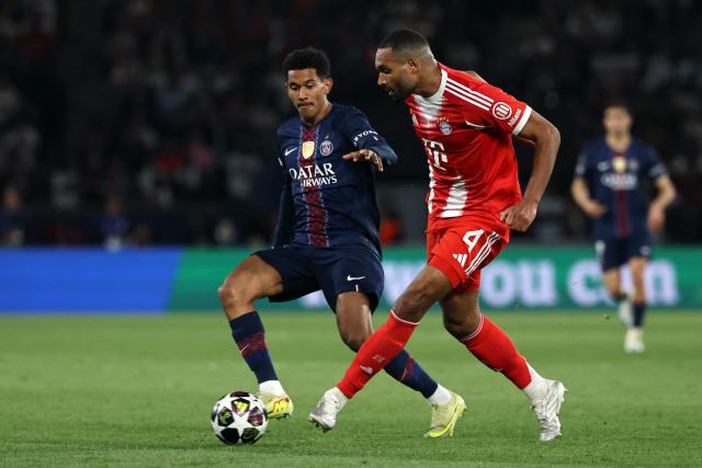 Paris Saint-Germain's French midfielder #24 Senny Mayulu fights for the ball with Bayern Munich's German defender #04 Jonathan Tah during the UEFA Champions League semi-final first leg football match between Paris Saint-Germain (PSG) and Bayern Munich at the Parc des Princes in Paris on April 28, 2026. (Photo by Anne-Christine POUJOULAT / AFP)