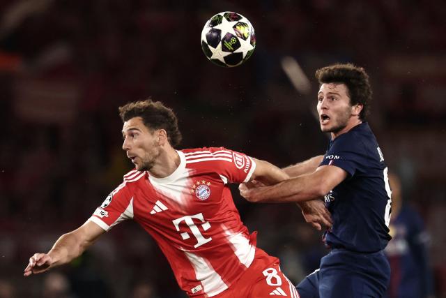 Bayern Munich's German midfielder #08 Leon Goretzka fights for the ball with Paris Saint-Germain's Portuguese midfielder #87 Joao Neves (R) during the UEFA Champions League semi-final first leg football match between Paris Saint-Germain (PSG) and Bayern Munich at the Parc des Princes in Paris on April 28, 2026. (Photo by FRANCK FIFE / AFP)