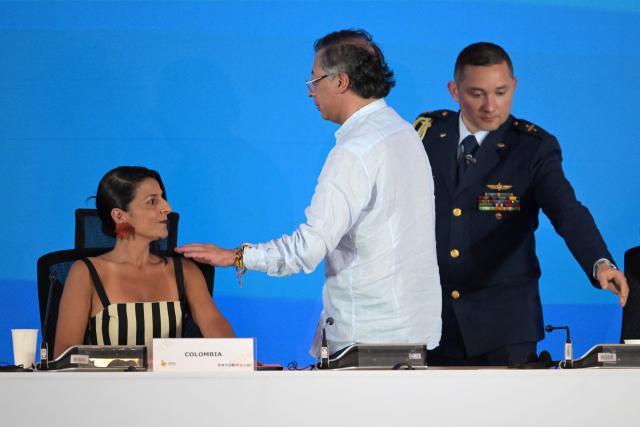 Colombia's President Gustavo Petro (C) and Colombia's Environment Minister Irene Velez (L) attend the International Conference on the Just Transition Away from Fossil Fuels in Santa Marta, Colombia, on April 28, 2026. (Photo by Raul ARBOLEDA / AFP)