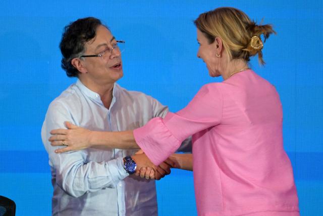 Colombia's President Gustavo Petro (L) greets Dutch Minister of Climate and Green Growth Stientje van Veldhoven during the International Conference on the Just Transition Away from Fossil Fuels in Santa Marta, Colombia, on April 28, 2026. (Photo by Raul ARBOLEDA / AFP)