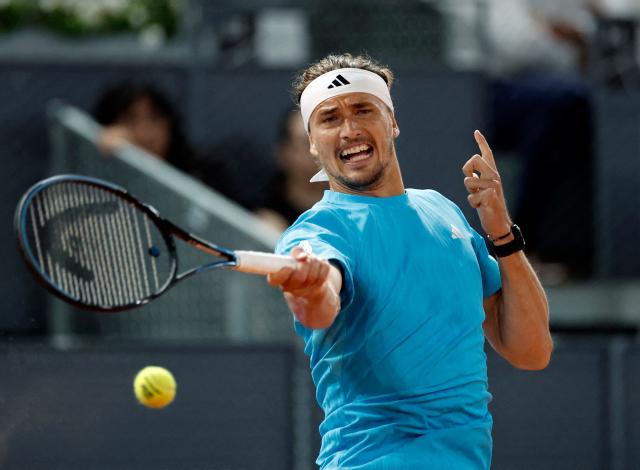 Germany's Alexander Zverev returns the ball to Czech Republic's Jakub Mensik during their 2026 ATP Tour Madrid Open tennis tournament singles match at the Caja Magica in Madrid, on April 28, 2026. (Photo by OSCAR DEL POZO / AFP)