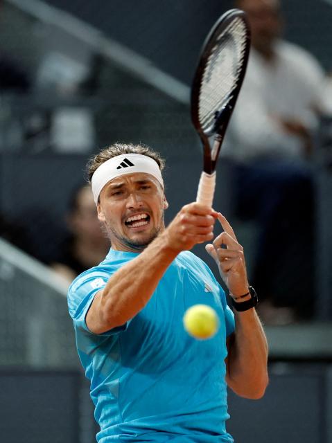 Germany's Alexander Zverev returns the ball to Czech Republic's Jakub Mensik during their 2026 ATP Tour Madrid Open tennis tournament singles match at the Caja Magica in Madrid, on April 28, 2026. (Photo by OSCAR DEL POZO / AFP)