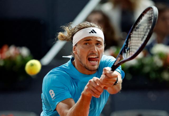 Germany's Alexander Zverev returns the ball to Czech Republic's Jakub Mensik during their 2026 ATP Tour Madrid Open tennis tournament singles match at the Caja Magica in Madrid, on April 28, 2026. (Photo by OSCAR DEL POZO / AFP)