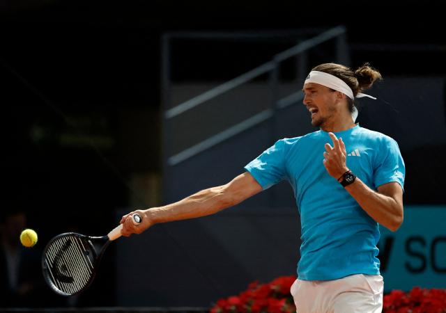 Germany's Alexander Zverev returns the ball to Czech Republic's Jakub Mensik during their 2026 ATP Tour Madrid Open tennis tournament singles match at the Caja Magica in Madrid, on April 28, 2026. (Photo by OSCAR DEL POZO / AFP)