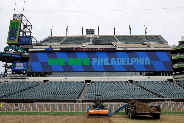 Workers prepare the field at Lincoln Financial Field, one of the stadium hosting the 2026 FIFA World Cup at Lincoln Financial Field in Philadelphia, on April 28, 2026. (Photo by ANGELA WEISS / AFP)