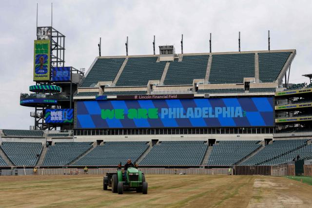 Workers prepare the field at Lincoln Financial Field, one of the stadiums hosting the 2026 FIFA World Cup at Lincoln Financial Field in Philadelphia, on April 28, 2026. (Photo by ANGELA WEISS / AFP)