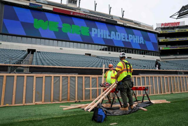 Workers prepare the field at Lincoln Financial Field, one of the stadiums hosting the 2026 FIFA World Cup at Lincoln Financial Field in Philadelphia, on April 28, 2026. (Photo by ANGELA WEISS / AFP)