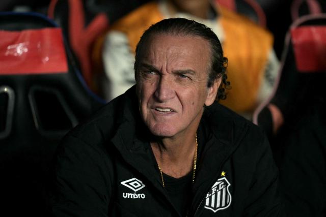 Santos' head coach Cuca looks on ahead of the Copa Sudamericana group stage football match between Argentina's San Lorenzo and Brazil's Santos at the Pedro Bidegain stadium in Buenos Aires on April 28, 2026. (Photo by JUAN MABROMATA / AFP)