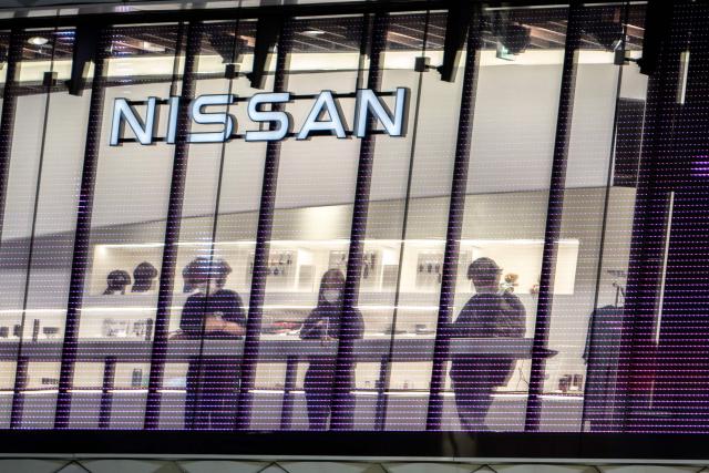 The logo of Japanese automaker Nissan is seen at a showroom in Tokyo's Ginza district on April 28, 2026. (Photo by Philip FONG / AFP)