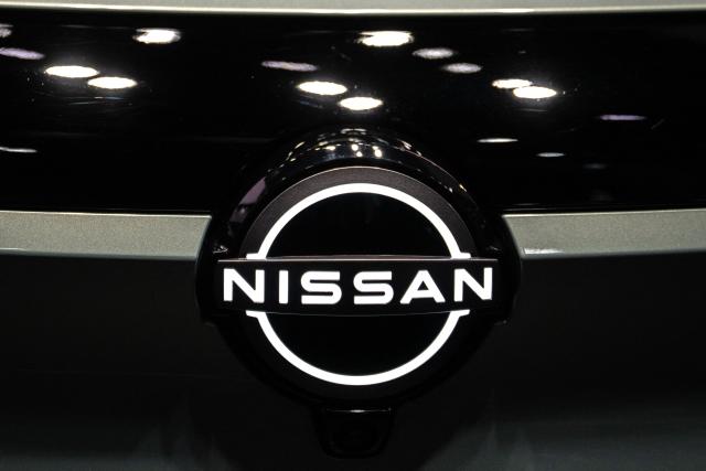 The logo of Japanese automaker Nissan is seen at a showroom in Tokyo's Ginza district on April 28, 2026. (Photo by Philip FONG / AFP)