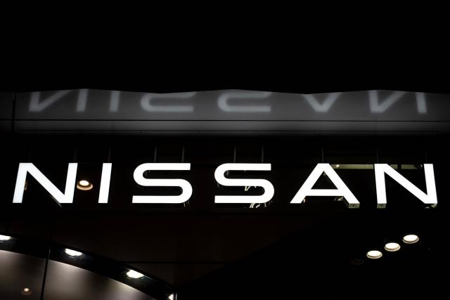 The logo of Japanese automaker Nissan is seen at a showroom in Tokyo's Ginza district on April 28, 2026. (Photo by Philip FONG / AFP)