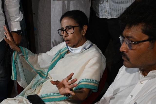 Chief Minister of West Bengal and Chairperson of All India Trinamool Congress, Mamata Banerjee reacts as she visits her constituency during the second and final phase of West Bengal Legislative Assembly elections in Kolkata on April 29, 2026. (Photo by Dibyangshu SARKAR / AFP)