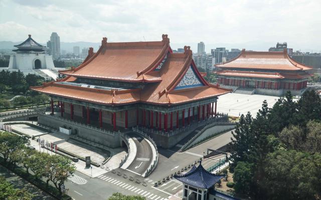 Taiwan's National Chiang Kai-shek Memorial Hall (backgorund L), the National Concert Hall (C) and the National Theater (R) are seen in Taipei on March 17, 2026. (Photo by I-Hwa Cheng / AFP)