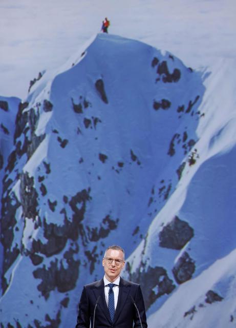Chief Executive Officer (CEO) of Munich Re Group, Christoph Jurecka addresses shareholders during the Annual General Meeting (AGM) of the reinsurer at the headquarters in Munich, southern Germany, on April 29, 2026. (Photo by Michaela STACHE / AFP)