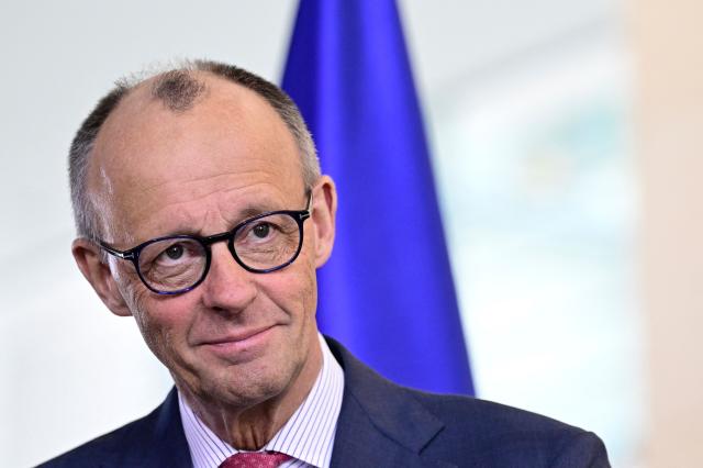 German Chancellor Friedrich Merz gives a press statement with the German Health Minister at the Chancellery in Berlin on April 29, 2026. (Photo by John MACDOUGALL / AFP)