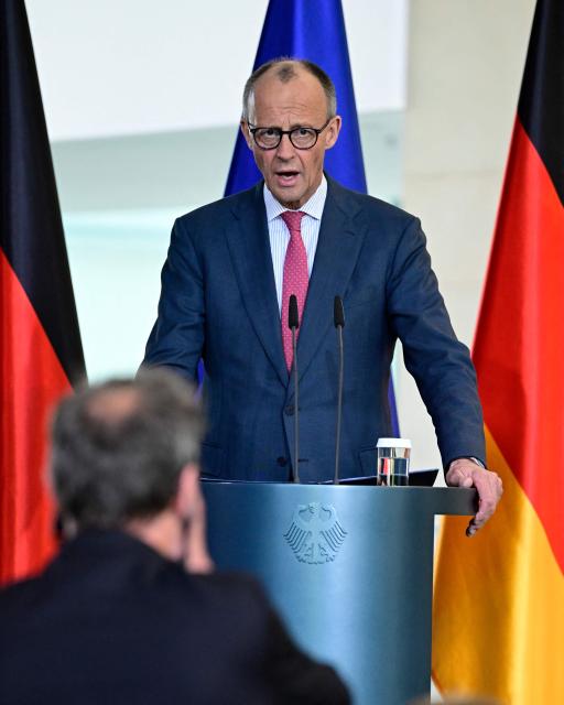 German Chancellor Friedrich Merz gives a press statement with the German Health Minister at the Chancellery in Berlin on April 29, 2026. (Photo by John MACDOUGALL / AFP)